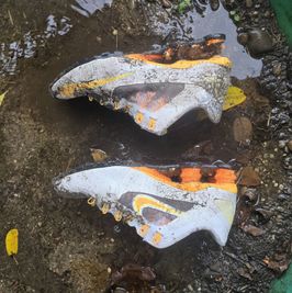 Destroyed muddy shox and socks