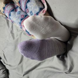 Mismatched adidas socks