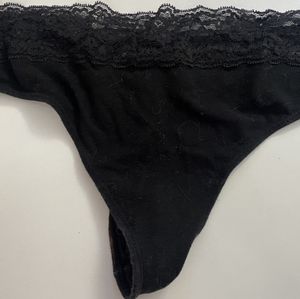 Worn black thong