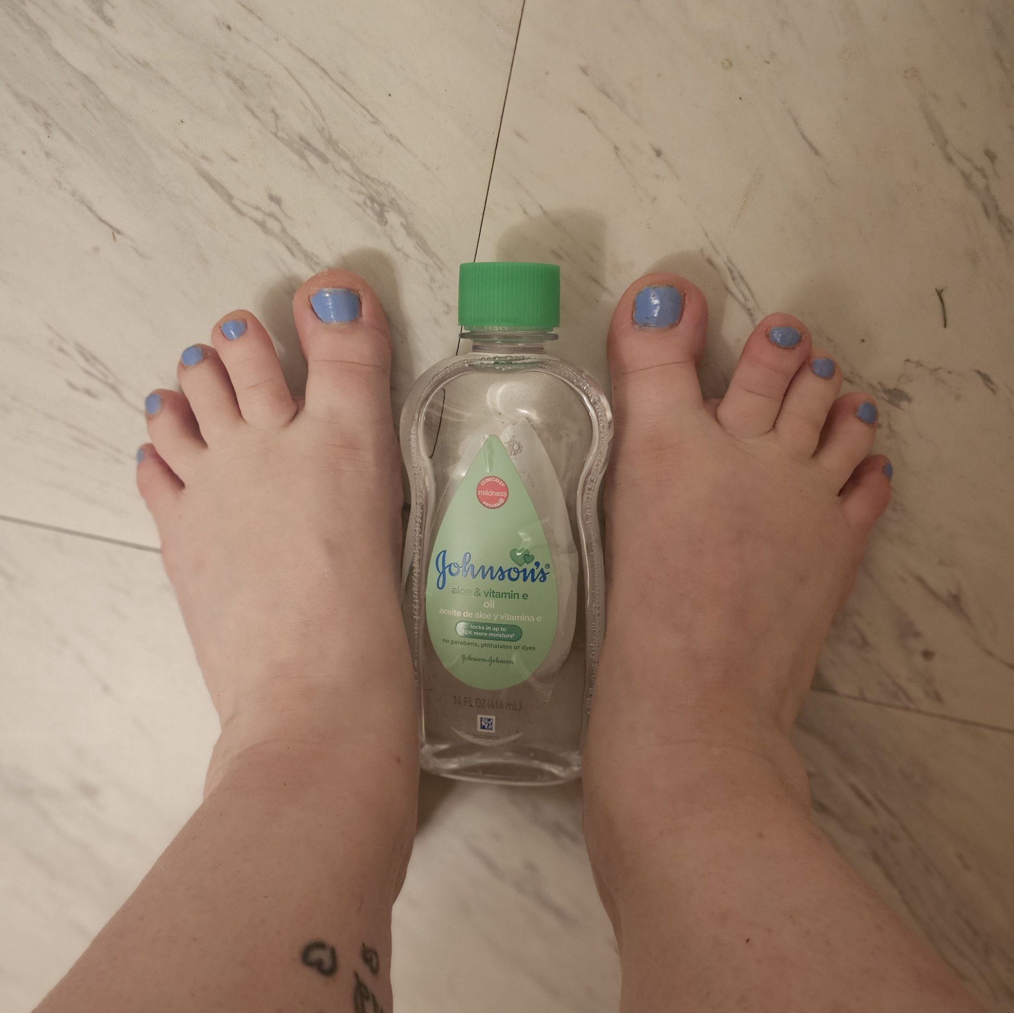 5 MIN VIDEO AND STILLS oiling my feet!