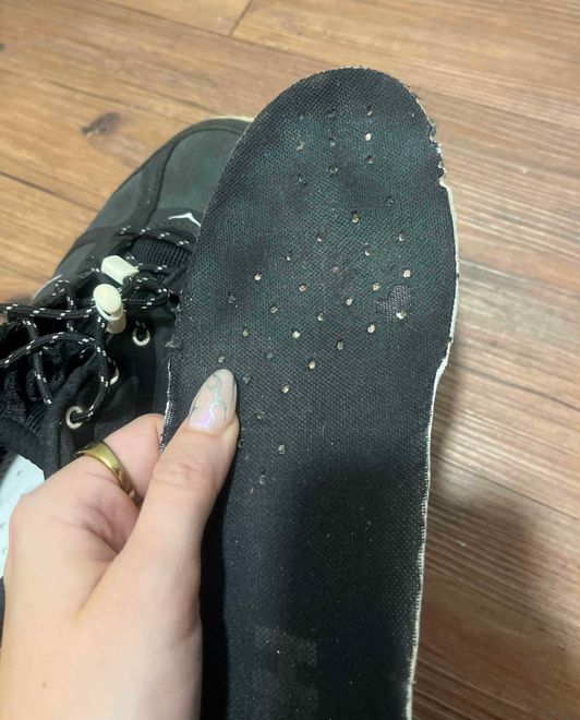 Worn running sneakers