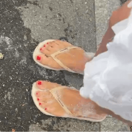 Young Woman FlipFlops in Foam