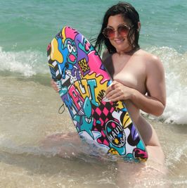 Nude Beach: Boogie Board on the Shore