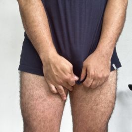 Nude photoshoot wearing a shirt showing big dick and asshole