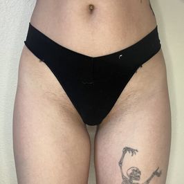 Worn black thong