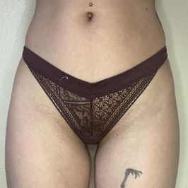 Worn maroon lace thong