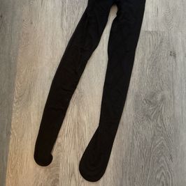 WORN BLACK TIGHTS WITH RINESTONES