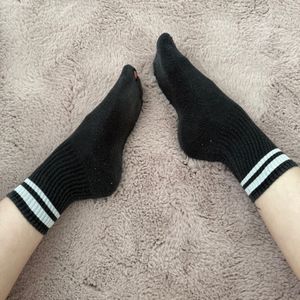WORN BLACK SOCKS