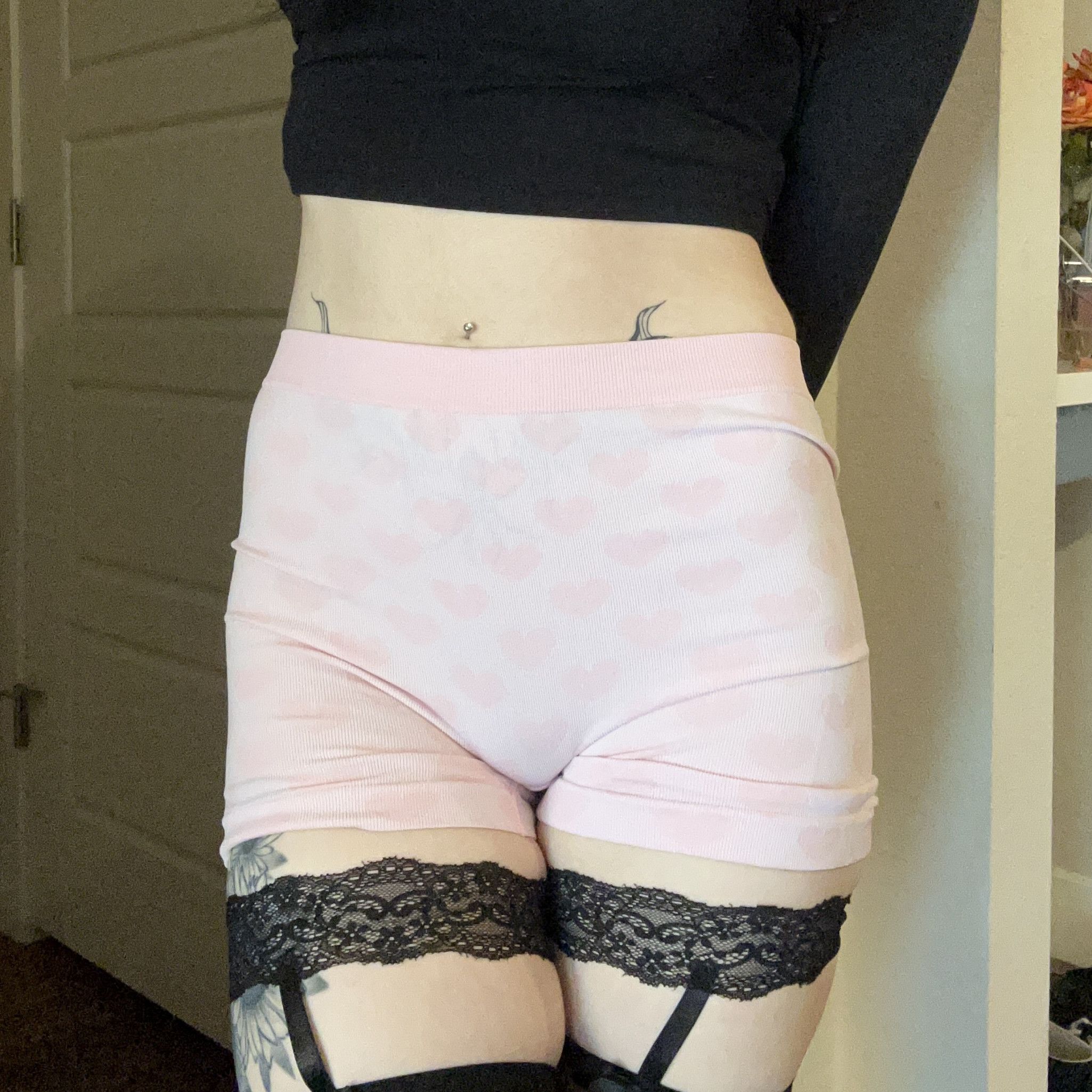 Worn pink heart print panties