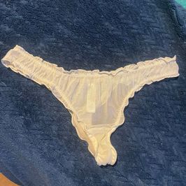 Frilly cream thong
