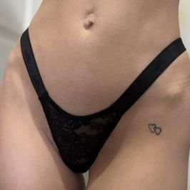 Tiny black thong