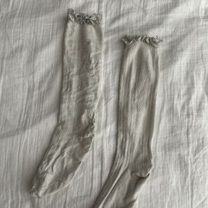Frilly white knee socks
