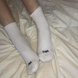 TNA Socks with Pink Stains