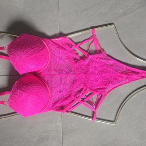 Hot pink body suit