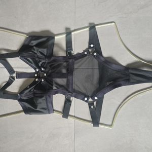 Black netted body suit