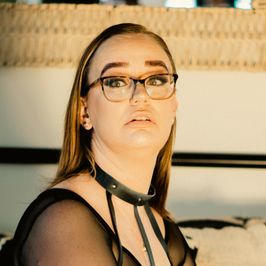 A Sheer Body Suit and Harness Photo Set