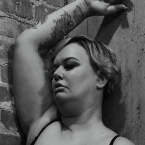 Looking Pretty on the Stairs in a Shelf Bra