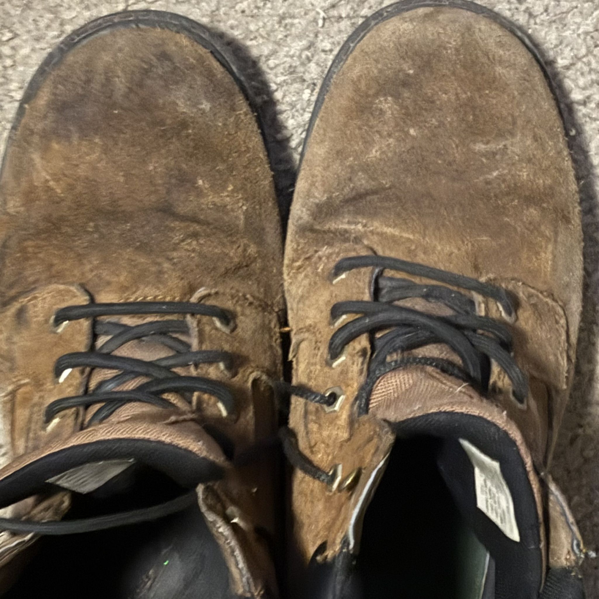 Worn Brown Leather Boots