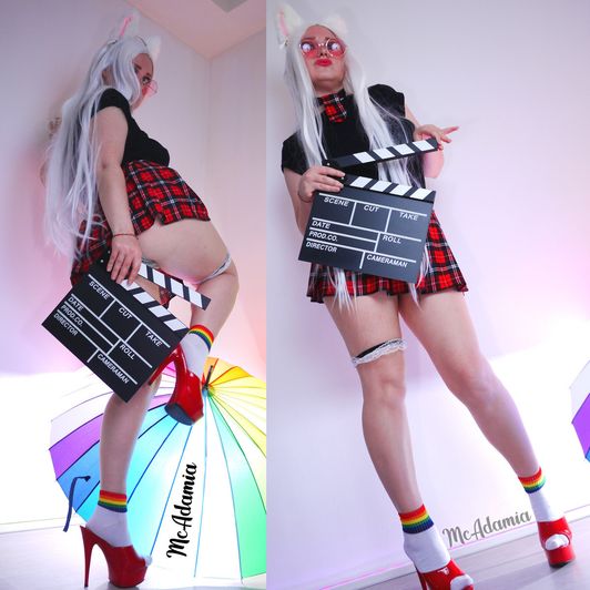 Clapperboard and rainbow umbrella