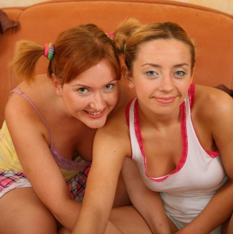 Two big tits lesbians play with strapon