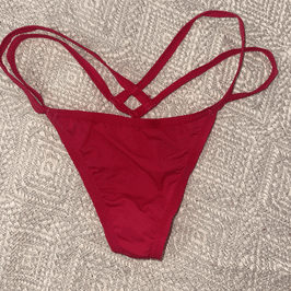 worn red strappy gstring