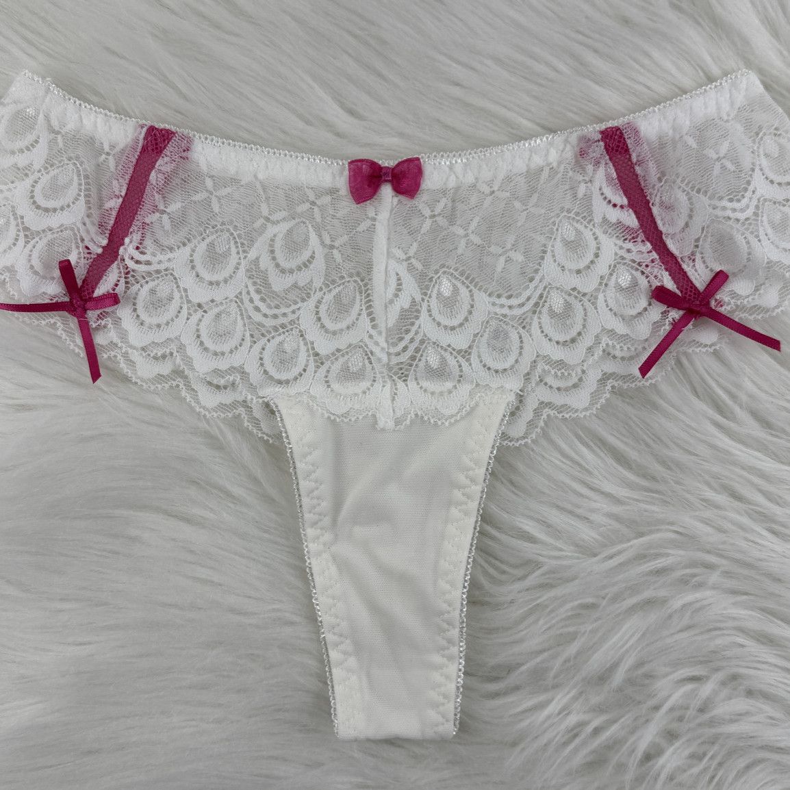 Peacock White Thongs