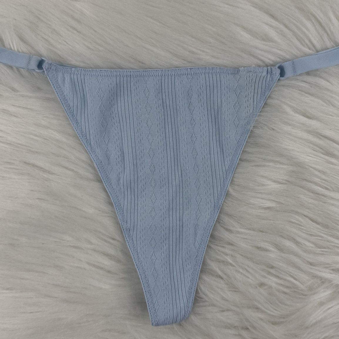 Blue Thongs with a Flower Charm