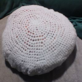 sparkly cushion with crocheted cover