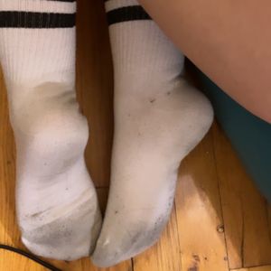 dirty worn white crew socks