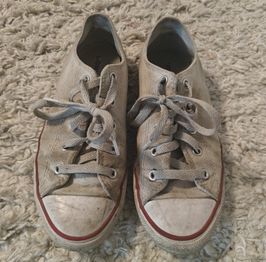 Very well worn white converse