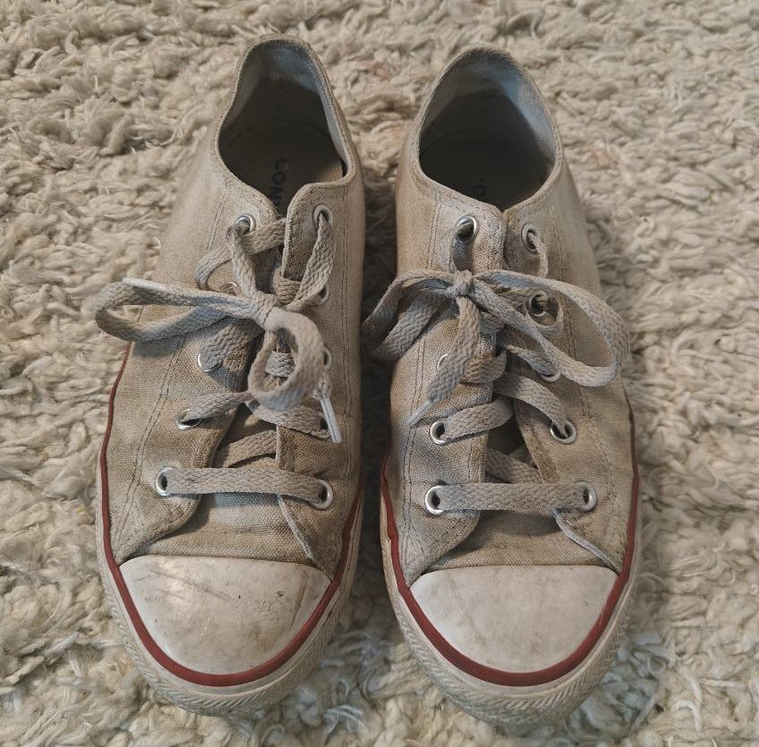 Very well worn white converse