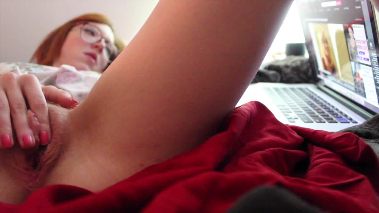 Candid Redhead watching porn