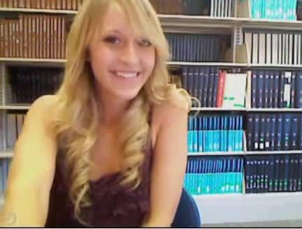 Ginger in Library in Brown Sun Dress