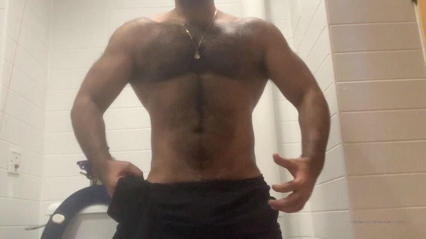 Hairy Muscle man flexing his muscles