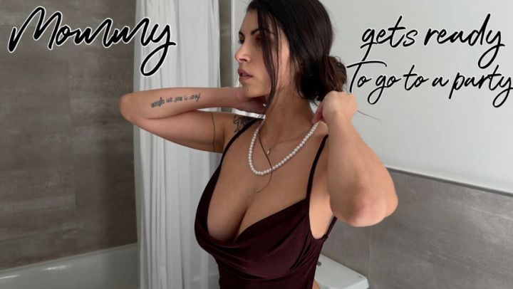 Mommy gets ready to go to a party