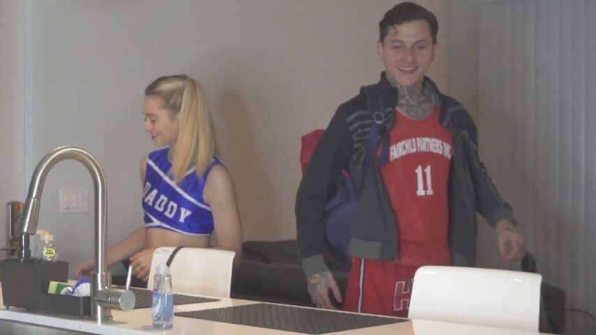 Cheerleader and basketball player