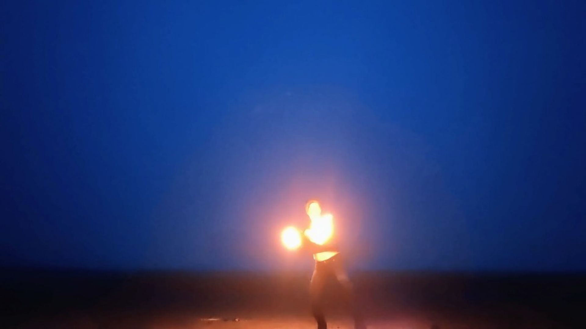 spinning fire on the beach