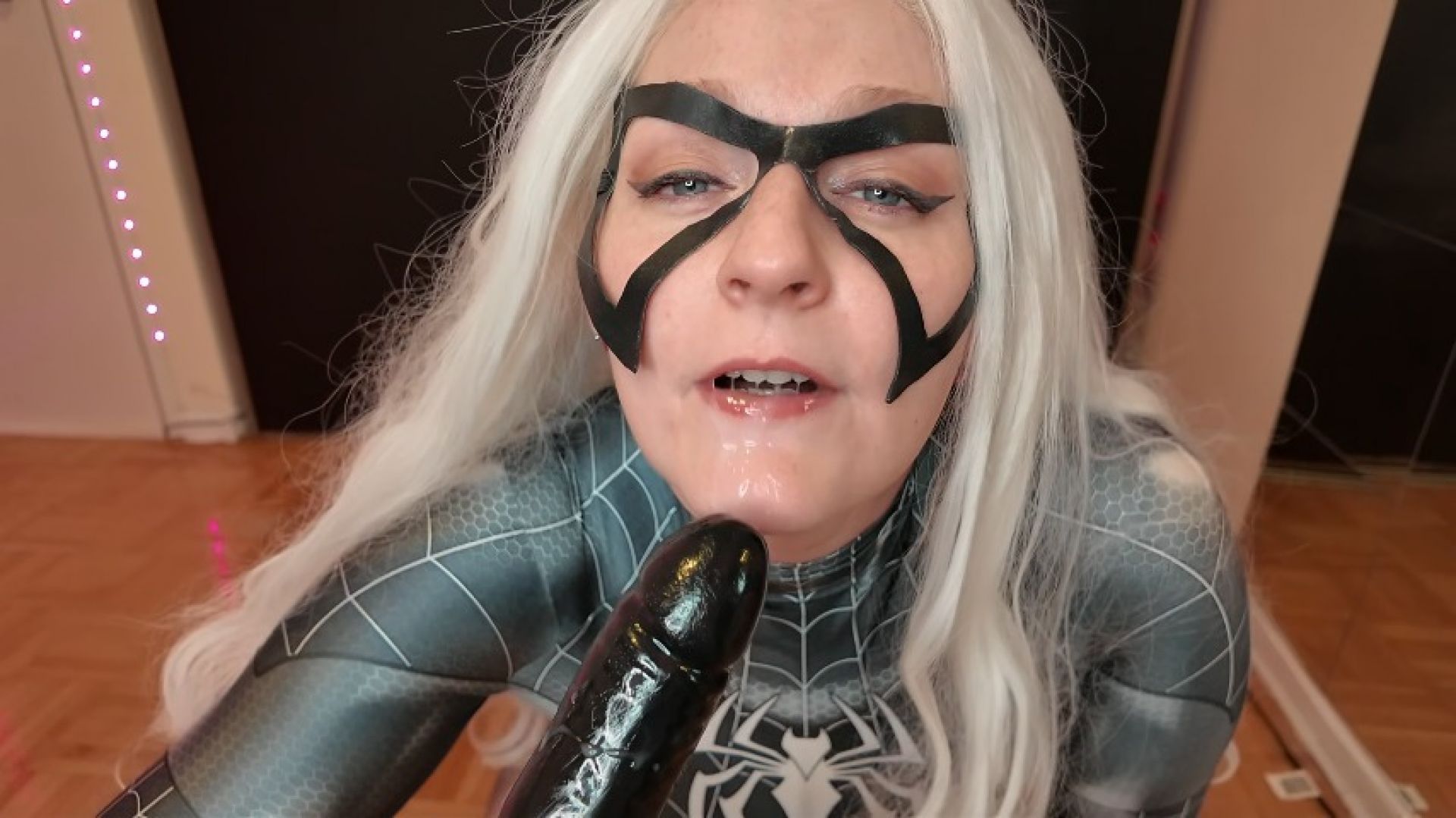 Black cat seduces Venom