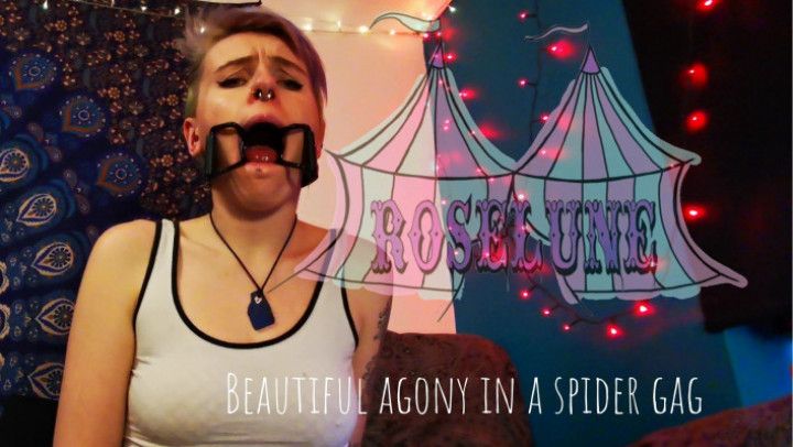 Beautiful agony in a spider gag