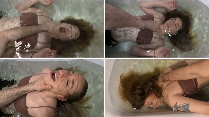 The guy teaches Anet to hold her breath underwater