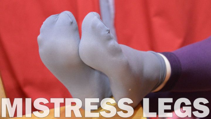 Soles and toes in grey nylon socks