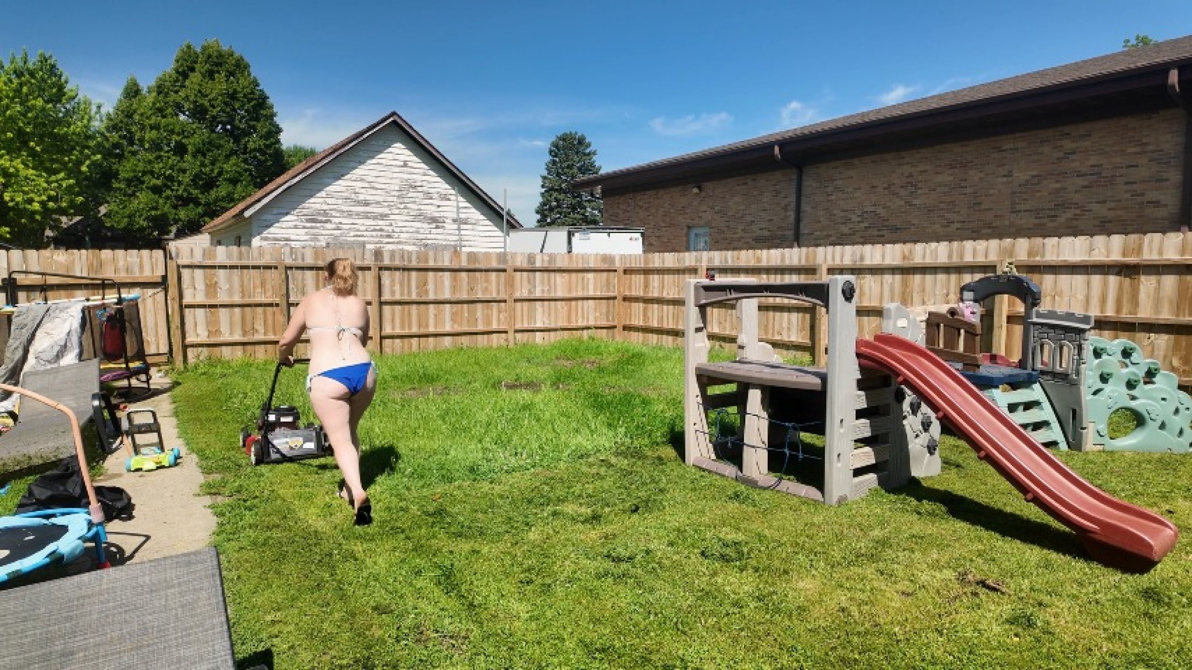 Hot MILF Mowing Lawn in New Bikini