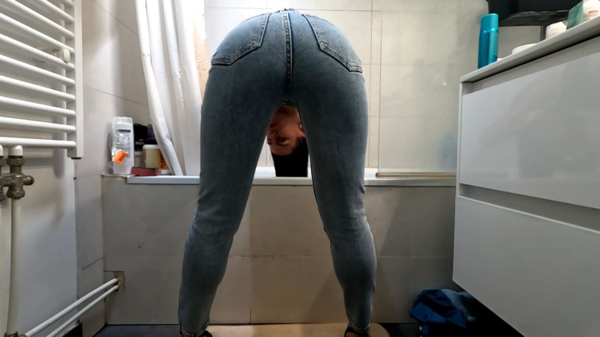 Hair washing routine in tight jeans