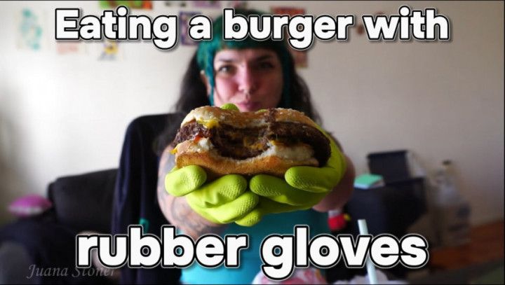 Eating a burger with rubber gloves