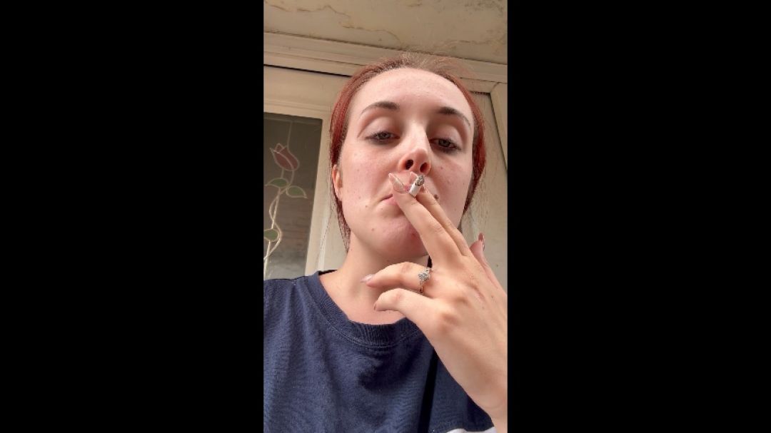 Chav smokes a roll up