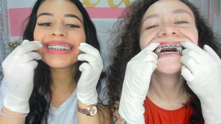 Two hot girls playing Brases