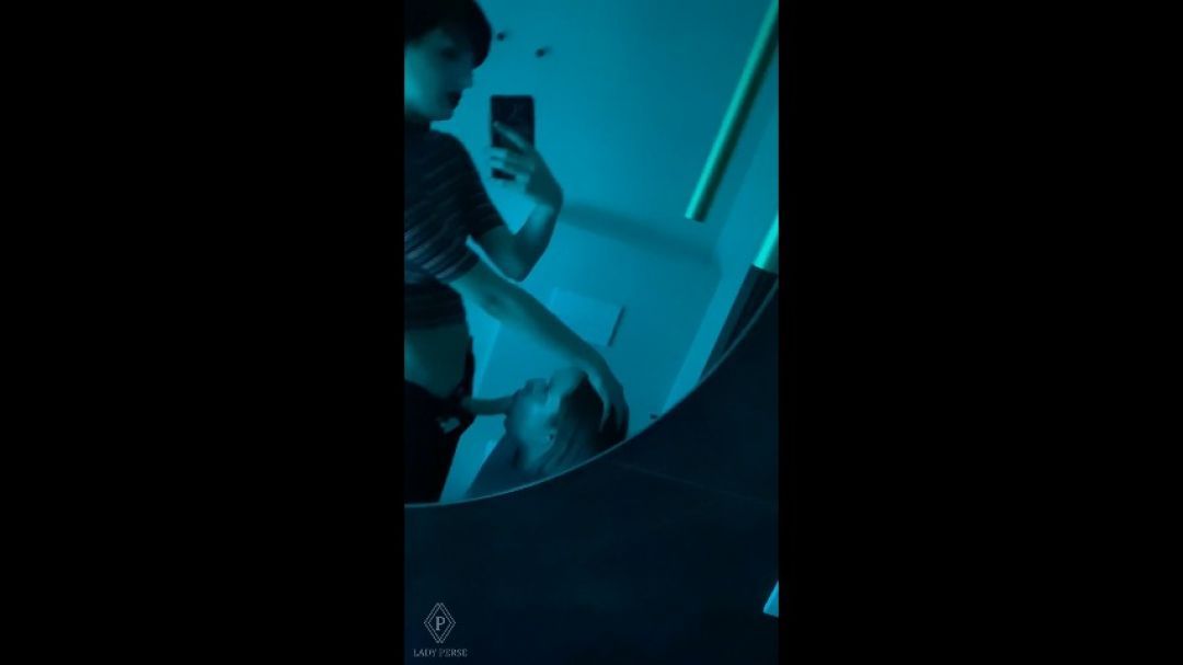 Lesbian strapon fucking in a public toilet in a club