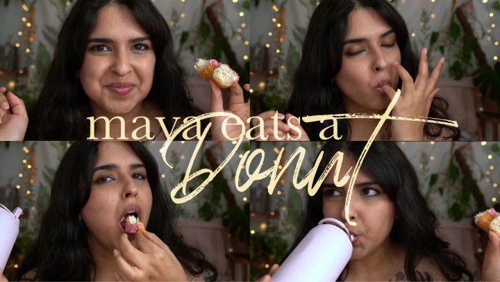MAYA EATS A DONUT