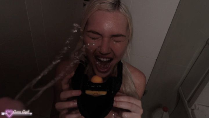 Toilet slut with her urinal gag
