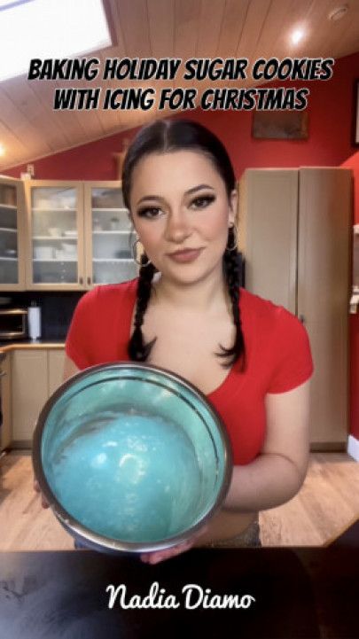 Baking Holiday Shaped Sugar Cookies With Icing For Christmas